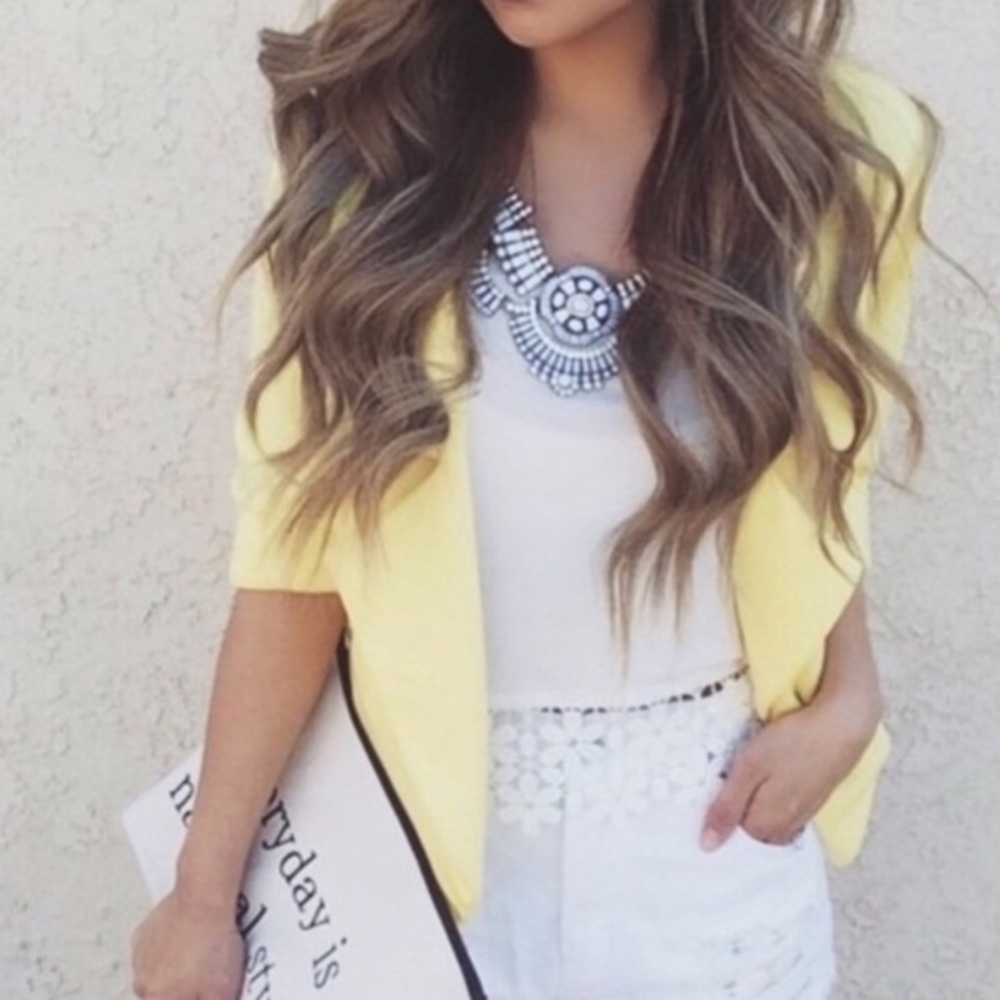 White fashion statement necklace.